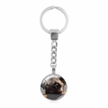 Pug dog themed metal keychain with a silver time gem pendant on a white background - Pug Looking Up (XSWX5756-9)