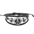Detail of layered black leather bracelet featuring woven straps and floral glass cabochon - Gorgeous Flower Cluster Peace Sign (XSWX5786-4)