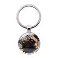 Round metal keychain featuring a cute Pug dog photo pendant on a white background - Cute Head-Tilt Pug (XSWX5758-9 Silver)