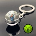 Detailed macro view of crystal glass keychain featuring Luminous Virgin Mary pendant - Virgin Mary 5 (XSWX5840-5)