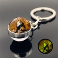 Detailed close-up of luminous religious glass ball keychain with Virgin Mary art design - Saint Image 6 (XSWX5840-6)