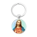 Porte-clés Sacré-Cœur de Jésus en métal argenté avec dôme en verre sur fond blanc - Sacré-Cœur de Jésus (XSWX1202-12)