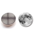Macro view of round moon-themed crystal glass fridge magnet showing front and back detail - Moon Landscape Style (BXT2517-11)