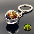 Luminous Holy Family glass ball keychain with silver metal ring and green glow effect - Holy Family (XSWX2486-19)