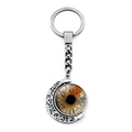 Detail of metal crescent moon keychain with double-sided rotating realistic eye pendant - Dark Brown Iris Style (XSWX9225-10)