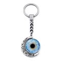 Detail of rotating crescent moon keychain with a blue evil eye glass pendant on silver link - Rotating Blue Iris Style (XSWX9225-9)