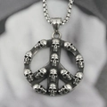 Titanium steel necklace with peace sign pendant and small skulls on grey fabric - Pendant With Box Chain