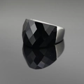 Polished silver ring with a large faceted black gemstone on a reflective dark background - US 6 / Black Rhinestone