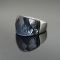 Exaggerated silver ring with large faceted deep blue crystal in a sleek mirror finish - Dark Blue Rhinestone