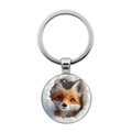 Cute cartoon fox in snow keychain pendant with silver metal ring and glass dome - Silver