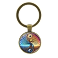 Portachiavi in bronzo vintage con ciondolo in vetro albero della vita e yin yang su fondo bianco - Bronzo Antico
