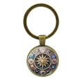Portachiavi vintage in bronzo con ciondolo astrologico con stelle dorate e simboli zodiacali - Bronzo Antico