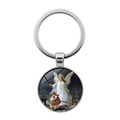 Elegante metalen sleutelhanger met beschermengel illustratie onder een glazen koepel - Zilver
