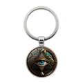 Macro shot of silver Hamsa Evil Eye keychain with blue eye design and glass dome - Vintage Totem Evil Eye Style (XSWX9046-7)
