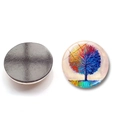 Macro detail of Tree of Life glass fridge magnet showing patterned front and magnetic back - Style 5 (XSWX6057-5)