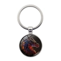 Detailaufnahme runder Metall-Schlüsselanhänger mit Feuerdrachen-Motiv unter Glas - Rot-Blau Verlauf Drachen Stil (XSWX8218-8)