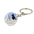 Silver metal keychain with double-sided glass dome featuring two horses running in snow - Two Horses in Snow Realistic (XSWX8236-7)