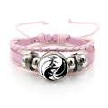 Pink braided leather bracelet featuring Yin Yang twin dragon charm and multilayered cords - Pink