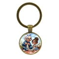 Llavero de bronce vintage con colgante de cristal de abuela y nieta tejiendo juntas lana - Bronce Antiguo