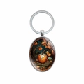 Close-up of oval glass keychain pendant featuring autumn pumpkins and leaves illustration - Pumpkin and Leaves Style (XSWX8259-6)