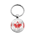 Macro detail of silver keychain featuring a vintage style Canada flag maple leaf design - Abrasion Texture (XSWX8417-8)