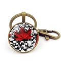 Detail of vintage bronze keychain with Canadian maple leaf glass pendant and lobster clasp - Red Maple Leaf And Gray Pebbles Style (XSWX8420-9) / Antique Bronze