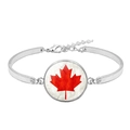 Detail of silver Canada flag bracelet showing the maple leaf emblem and lobster clasp chain - C-Shaped Semi-Rigid Maple Leaf Style (XSWX8424-10)