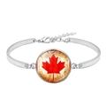 Silver bracelet featuring Canada flag red maple leaf under round glass cabochon charm - Distressed Yellow Maple Leaf Style (XSWX8424-3)