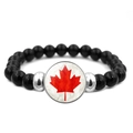 Macro shot of black beaded bracelet with Canadian maple leaf glass charm and silver spacers - Bright Red Glossy Maple Leaf Pattern (XSWX8423-10)