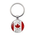 Llavero de metal plateado con un colgante redondo con el diseño de la bandera de Canadá - Patrón de Hoja de Arce Clásico (XSWX8415-1)