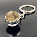 Porte-clés mappemonde vintage en verre avec anneau en métal argenté poli et reflet - Style de Carte de l'Amérique Nostalgique (XSWX8433-1)