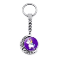 Detail of a rotating crescent moon keychain with a colorful cartoon unicorn and stars - Purple Starry Sky Unicorn Style (XSWX8449-10)
