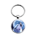 Porte-clés loup hurlant à la lune avec médaillon en verre et anneau en métal argenté - Hurlement de Loup dans la Nuit Bleue (XSWX8463-10)