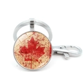Vintage silver metal Canada flag maple leaf keychain with lobster clasp and round glass pendant - Vintage Red Splatter Maple Style (XSWX8420-7) / Silver