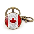 Retro bronze Canada flag keychain with maple leaf glass cabochon and lobster clasp - Classic Red And White Maple Style (XSWX8420-1) / Antique Bronze