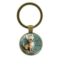 Portachiavi in metallo bronzo con simpatico Chihuahua e scritta Small But Mighty - Bronzo Antico
