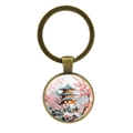 Vintage bronzen sleutelhanger met hanger met kersenbloesems en pagodepatroon - Antiek Brons