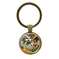 Vintage Bronze Schlüsselanhänger mit Engel der Goldmünzen gießt und Glasanhänger für Reichtum - Antikbronze