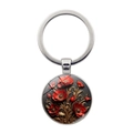 Silver metal keychain featuring a red poppy flower pattern under a glass dome pendant - Silver