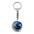 Rotating wolf pendant keychain with silver moon hollow frame and night sky glass gem - Lone Wolf Howling Silhouette (XSWX8432-1)