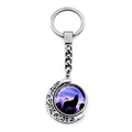 Silver alloy moon keychain featuring a rotating wolf pendant under a purple starry sky - Purple Starry Night Wolf (XSWX8432-5)