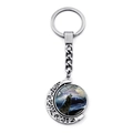 Rotating silver moon keychain with a howling wolf pendant and antique baroque patterns - Cosmic Galaxy Wolf (XSWX8432-18)