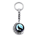 Rotating wolf howling moon keychain with silver metallic finish and crescent moon pendant - Wolf Howling Moon Silhouette (XSWX8432-21)