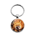 Detailed view of fox glass cabochon pendant with a silver metal keyring attachment - Funny Fox with Tongue Out (XSWX7825-12)