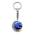Howling wolf silver keychain with rotating moon pendant and glass dome charm - Hollow Crescent Moon Wolf (XSWX8432-23)
