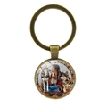 Porte-clés vintage en bronze avec motif femme autochtone et loups sous dôme de verre - Bronze Antique
