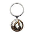 Polished metal keychain featuring a realistic yellow excavator design on a round pendant - Silver