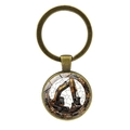 Industrial bronze excavator keychain with a vintage metal finish and glass pendant - Antique Bronze