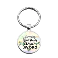 Detail of silver JW.ORG keychain with glass butterfly pendant and Bringing Good News text - Green Butterfly With Slogan (XSWX7896-7)