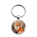 Silver metal keychain with round glass pendant featuring a red fox art illustration - Artistic Fox Illustration (XSWX7825-5)